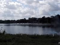 Pier built on private pond with 3 in. PVC pipe for post